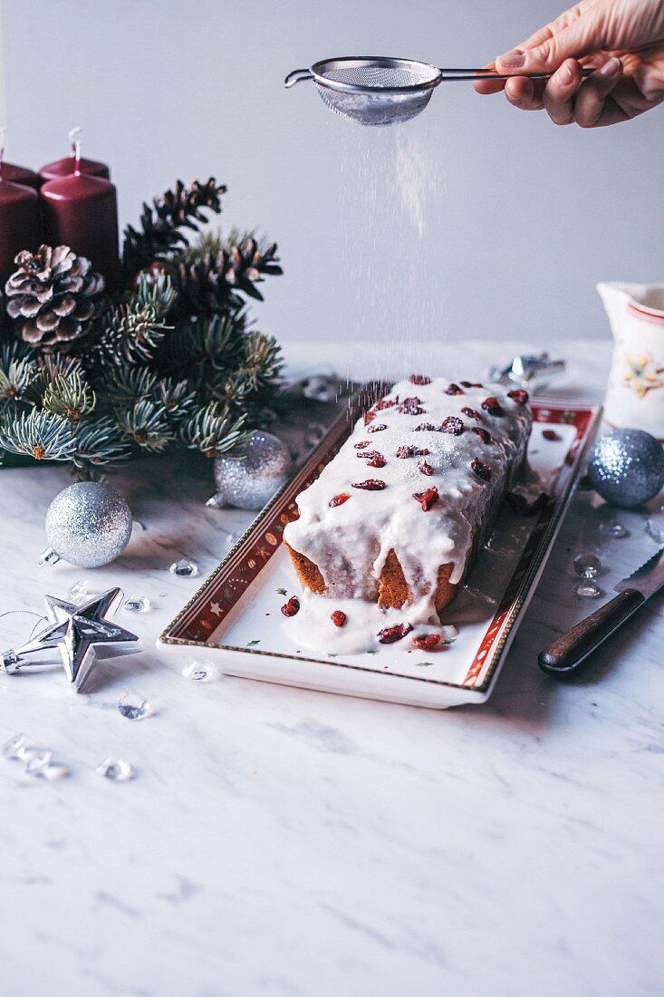 Christmas cranberry pound cake with coconut frosting