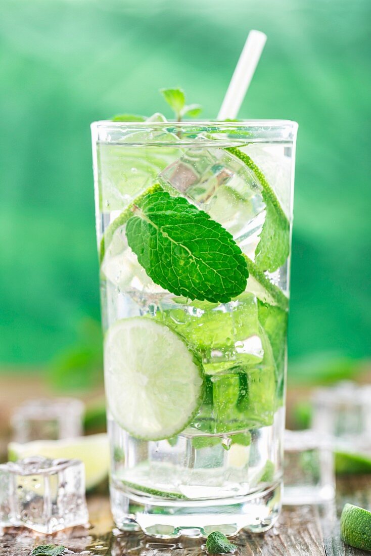 Ice cold cocktail with lime and mint