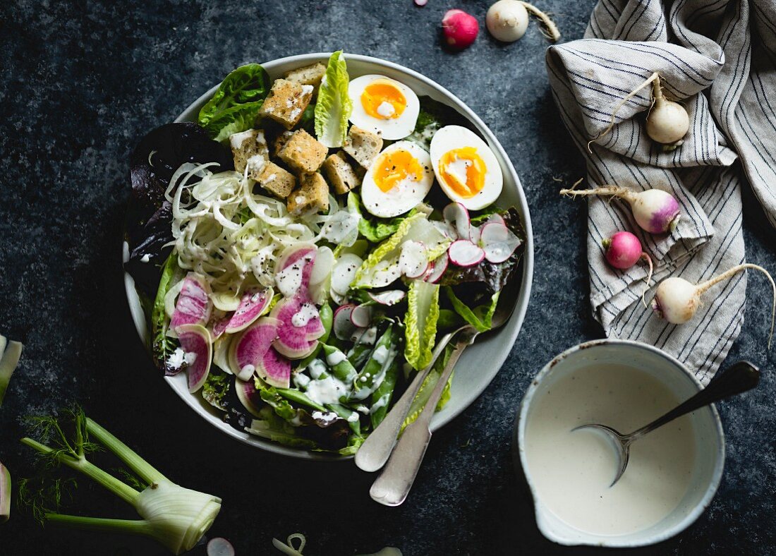 Spring greens salad with fennel, radish and miso-buttermilk dressing