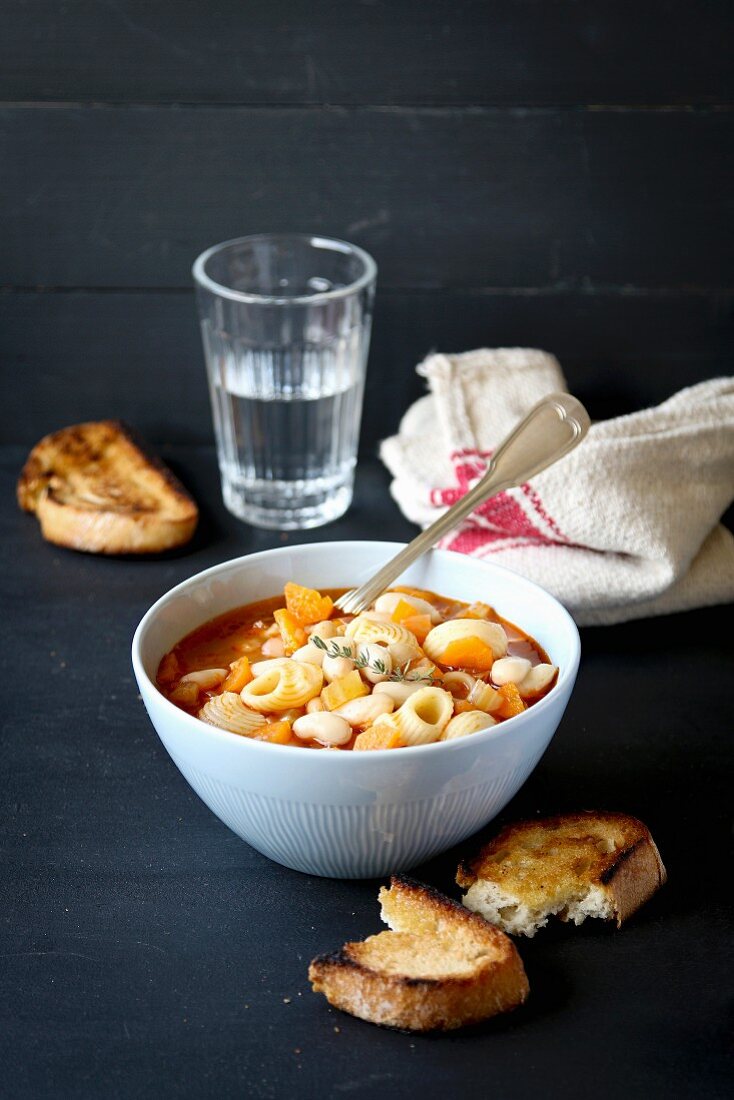 Bowl of Minestrone Soup with Pasta, Beans and Vegetables
