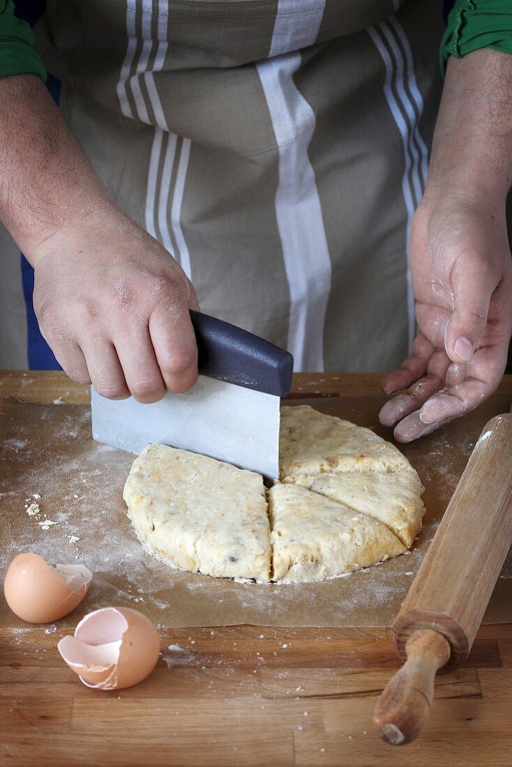 Cook preparing scones