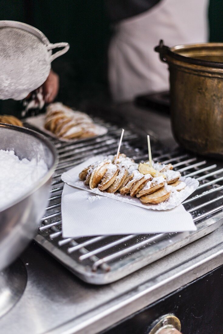 Dutch 'poffertjes' (small spongy pancakes) with icing sugar