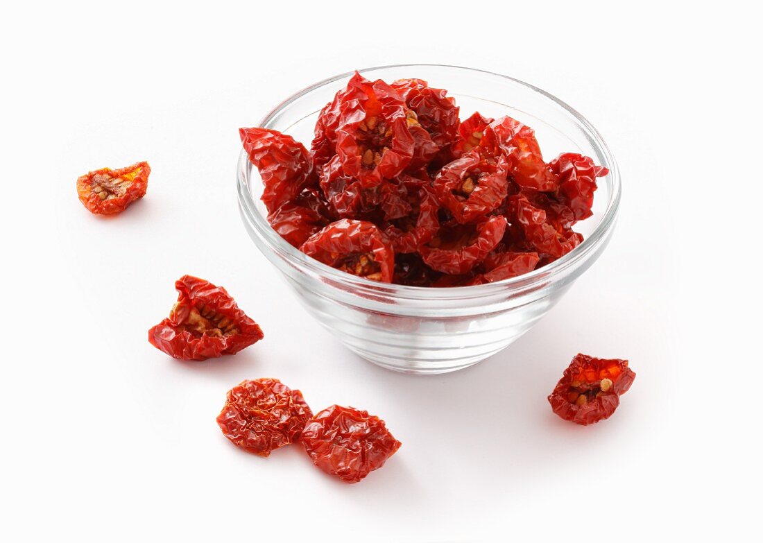 Dried cherry tomatoes in a glass bowl