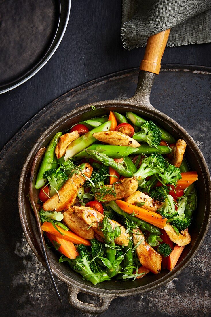 Brightly coloured pan-fried vegetables with balsamic chicken