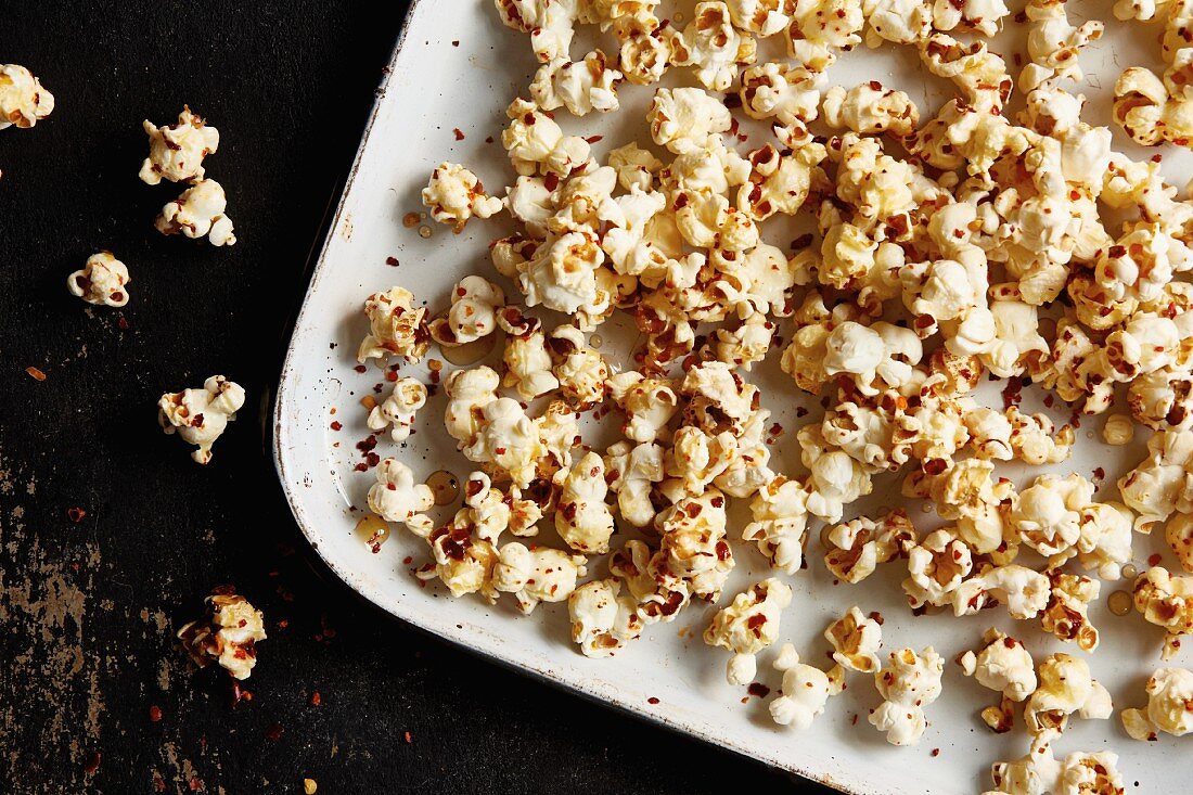 Homemade sweet and spicy popcorn with chilli and maple syrup