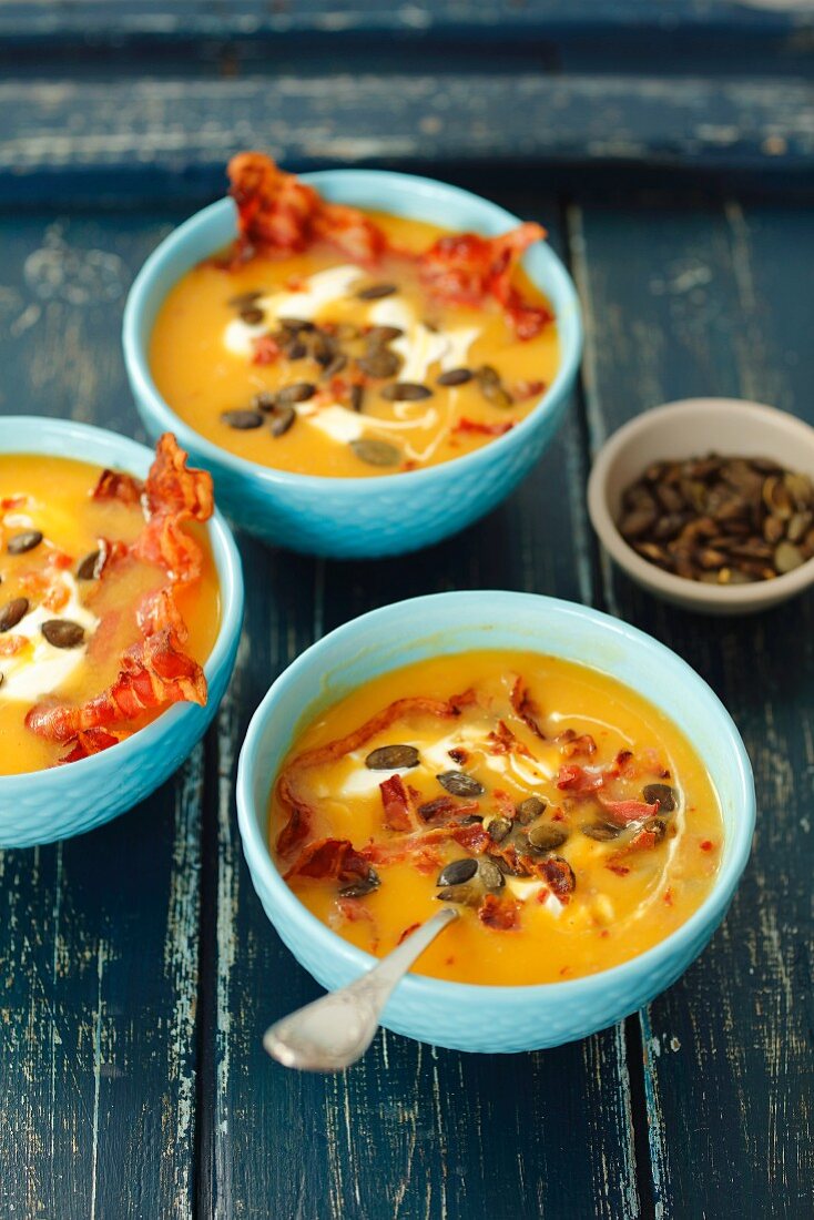 Pumpkin cream soup with caramelized bacon