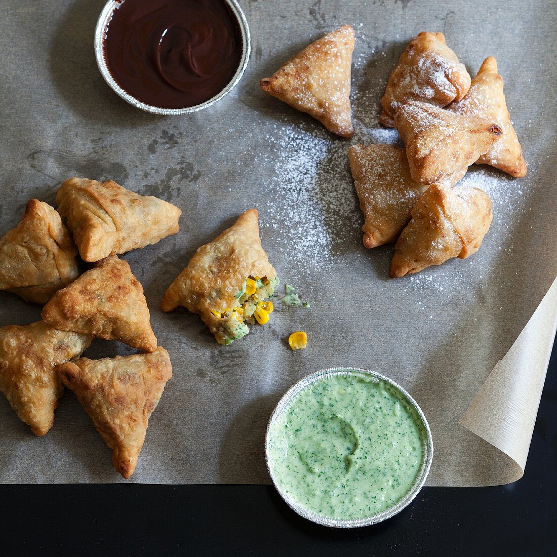 Sweet and savoury samosas with different dips