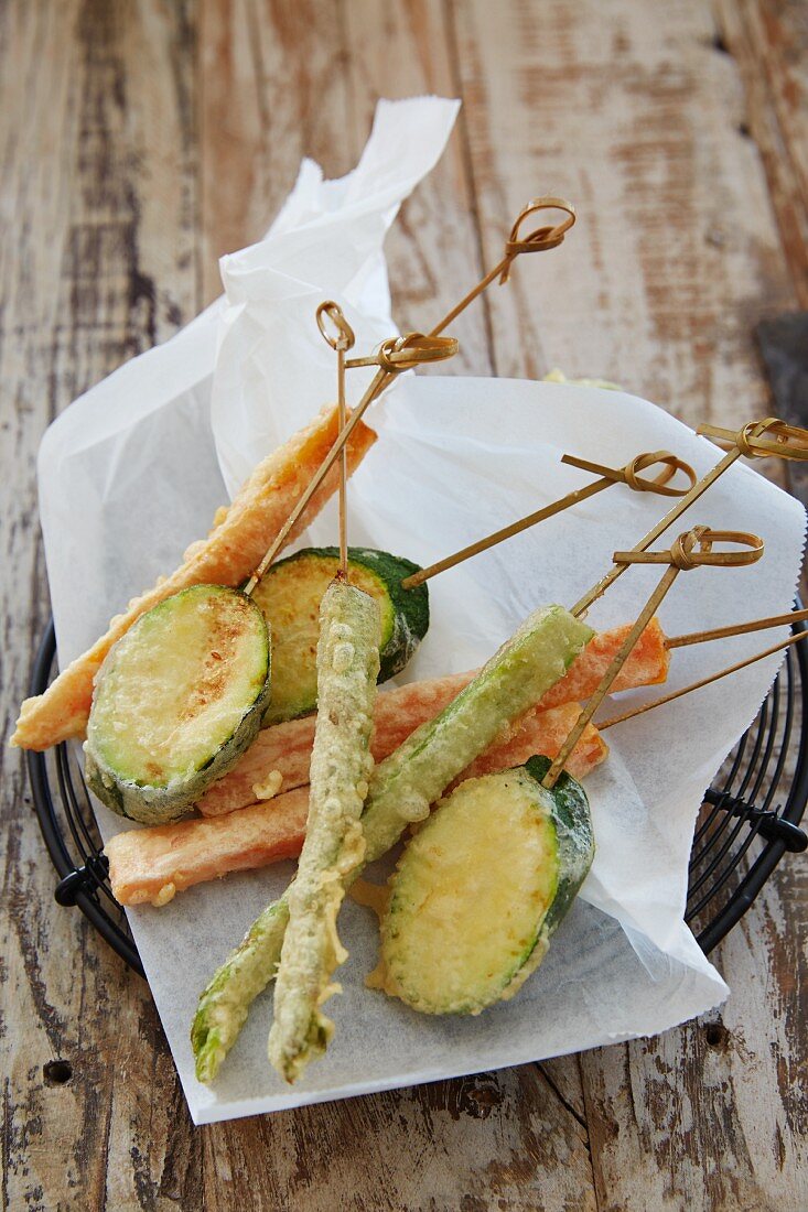 Vegetable tempura on skewers