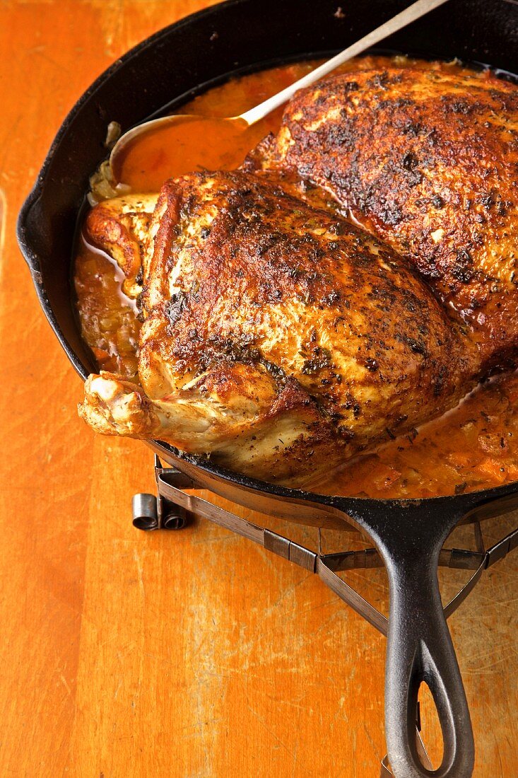 Turkey in iron pan with spicy sauce