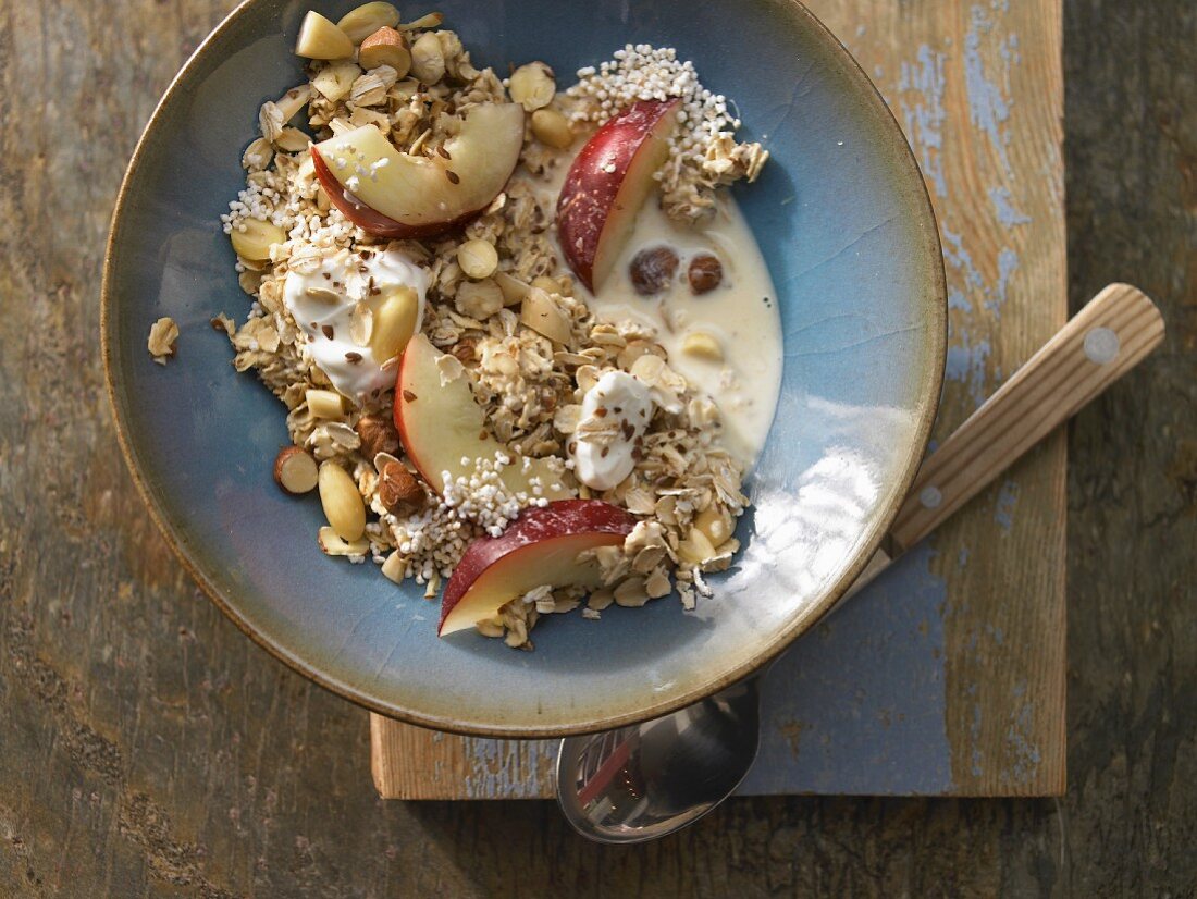 Amaranth and oat muesli with nuts and nectarine slices