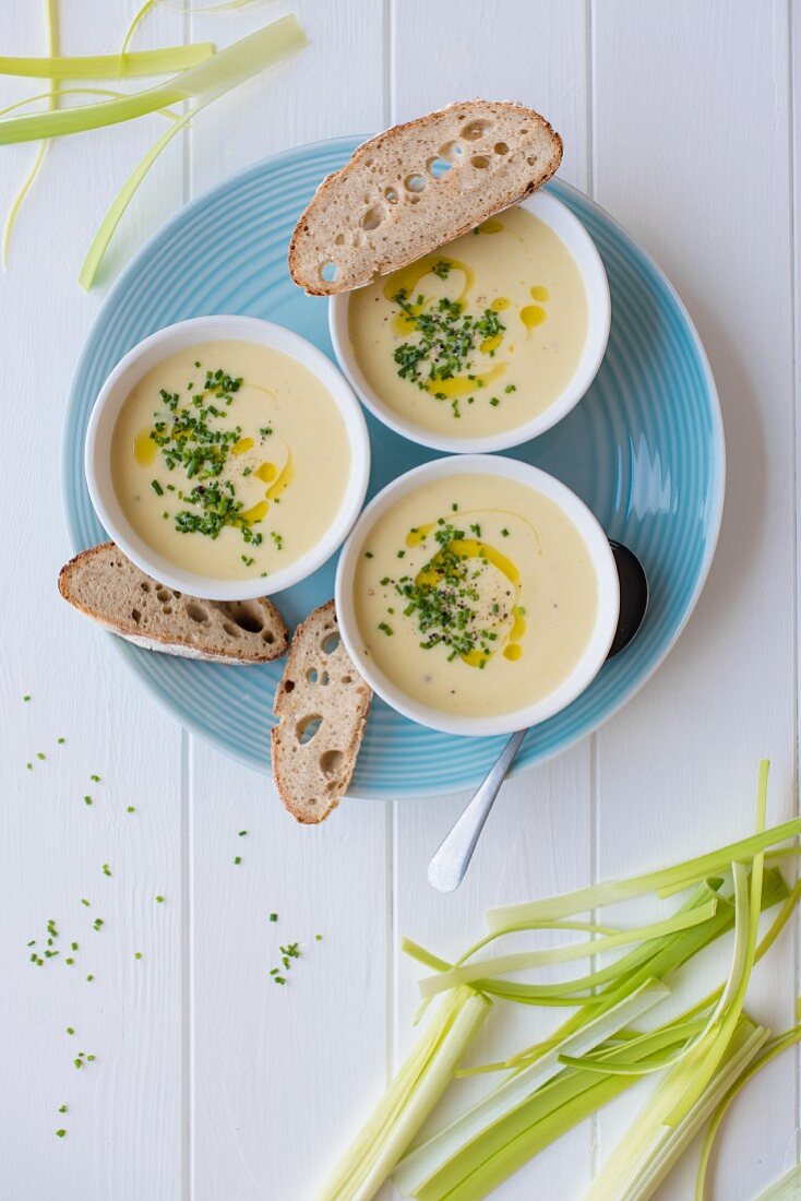 Vichyssoise soup (creamy leek and potato) with olive oil, fresh chive and sour dough bread