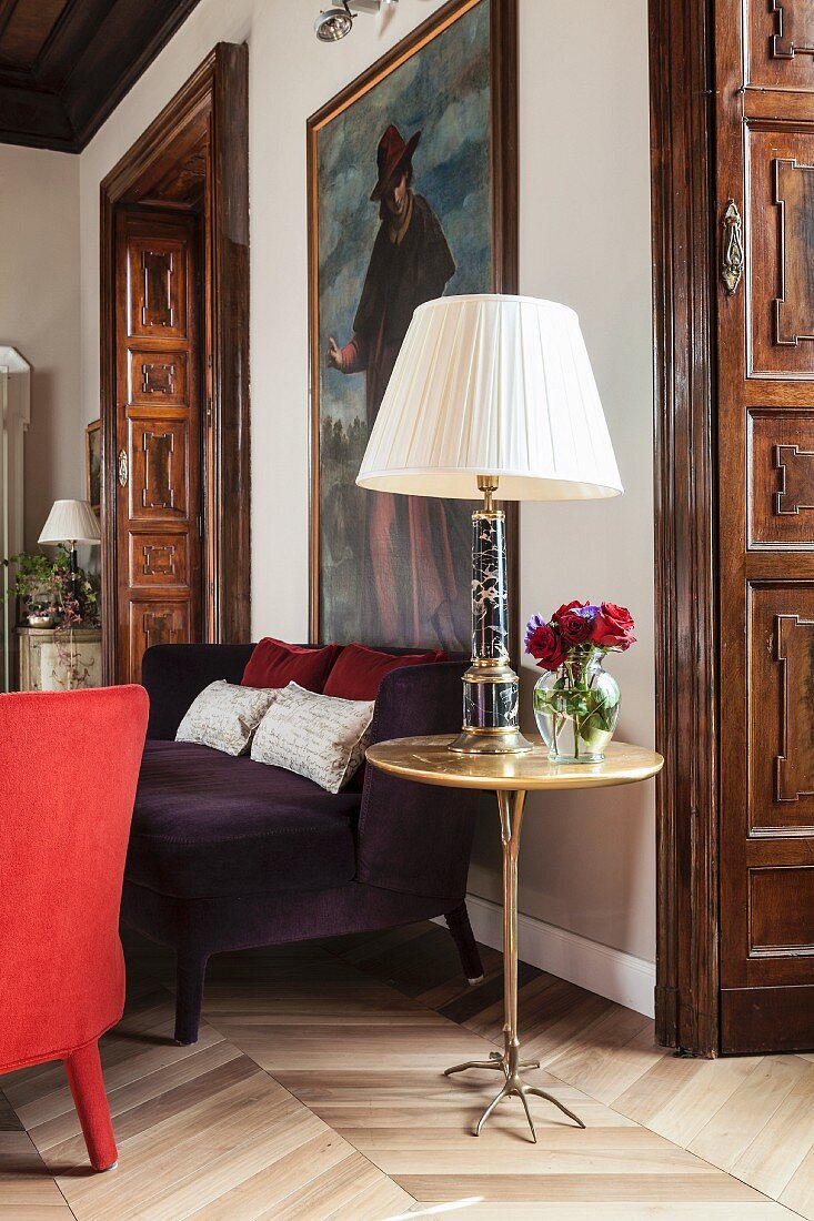 Classic table lamp on side table with bird feet