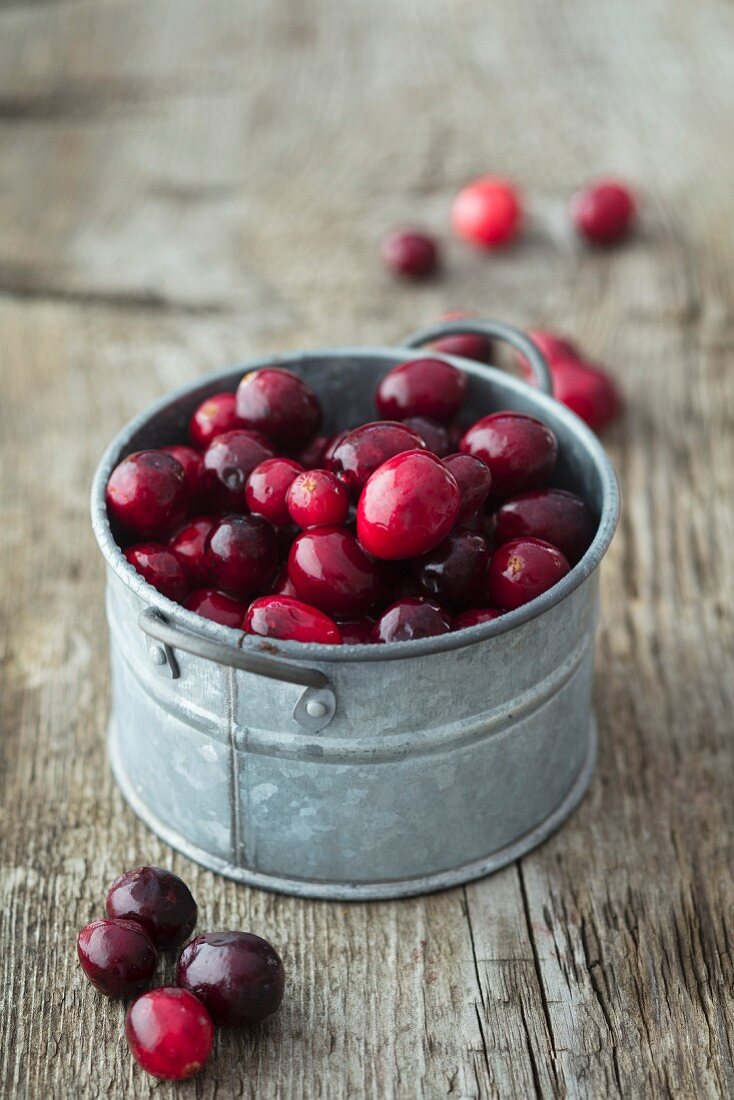 Cranberries in a pewter pot