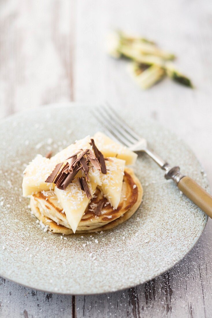 Pancakes with pineapple, coconut and chocolate
