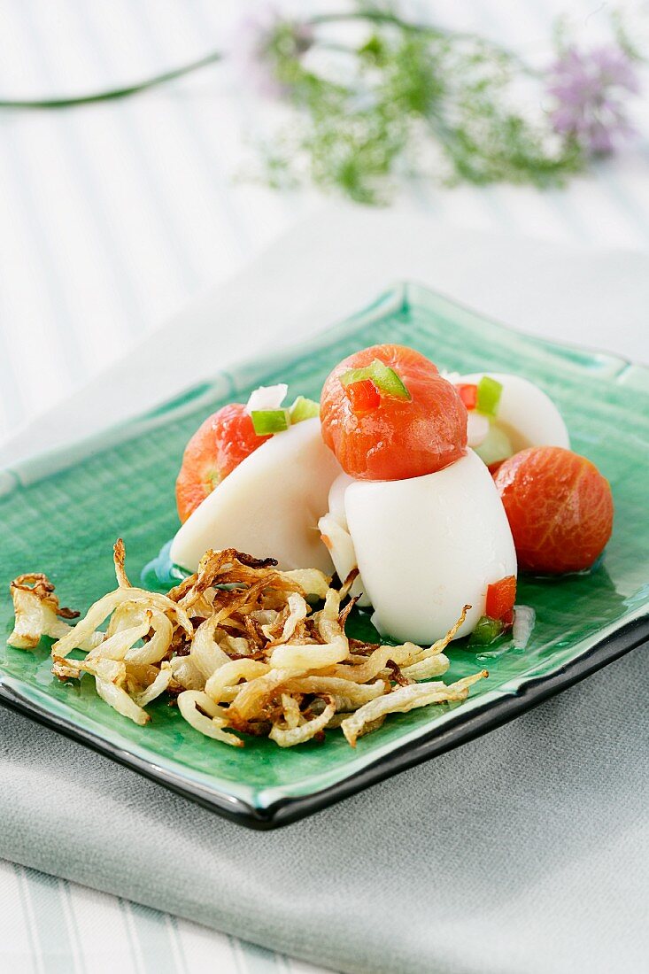 Squid and tomato salad with fried celeriac