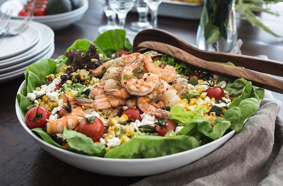 Sweetcorn salad with grilled prawns, tomatoes and feta