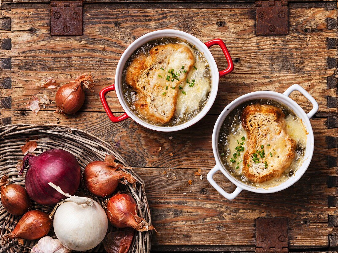 Onion soup with dried bread and cheddar cheese