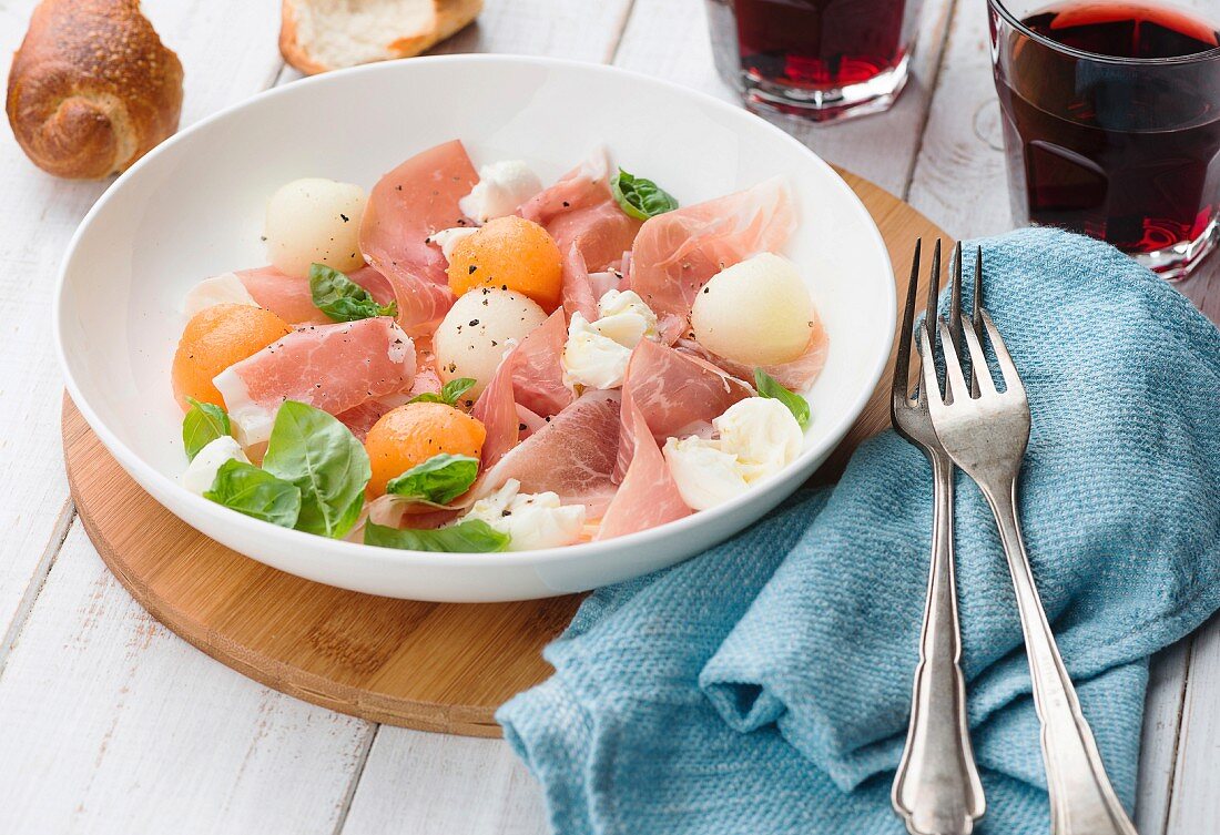 Melon and prosciutto ham salad with Mozzarella