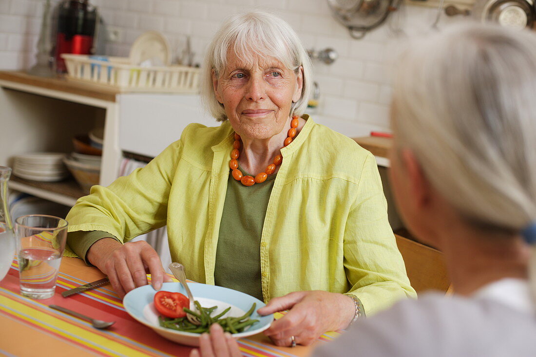 Elderly woman eating