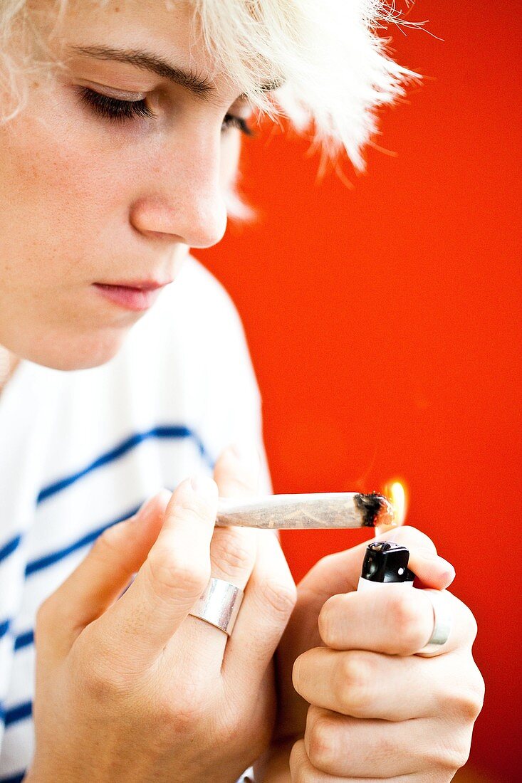Teenager smoking marijuana
