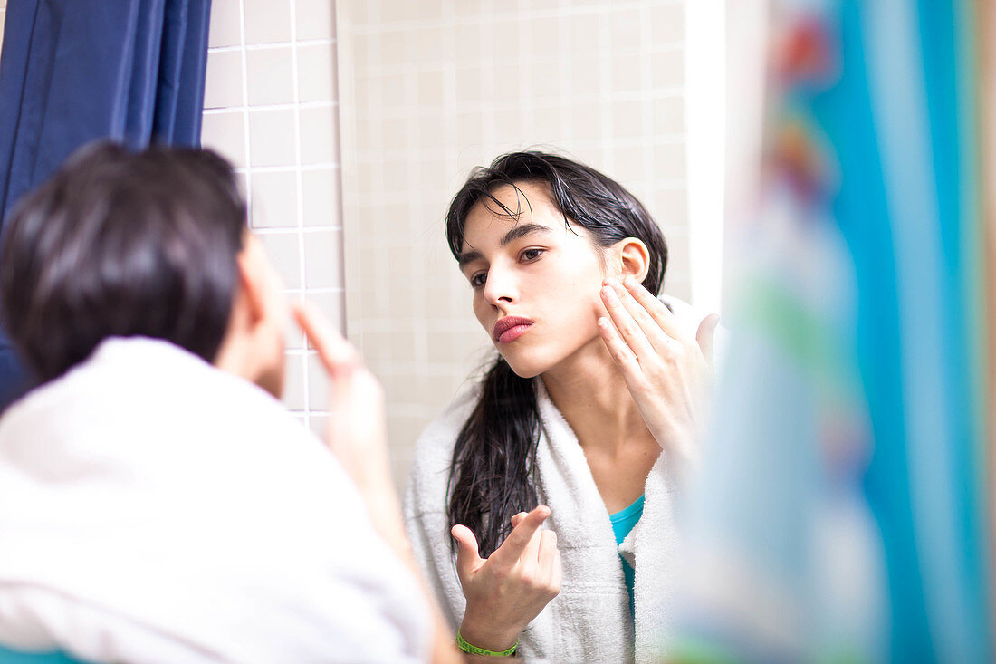 Woman applying cream