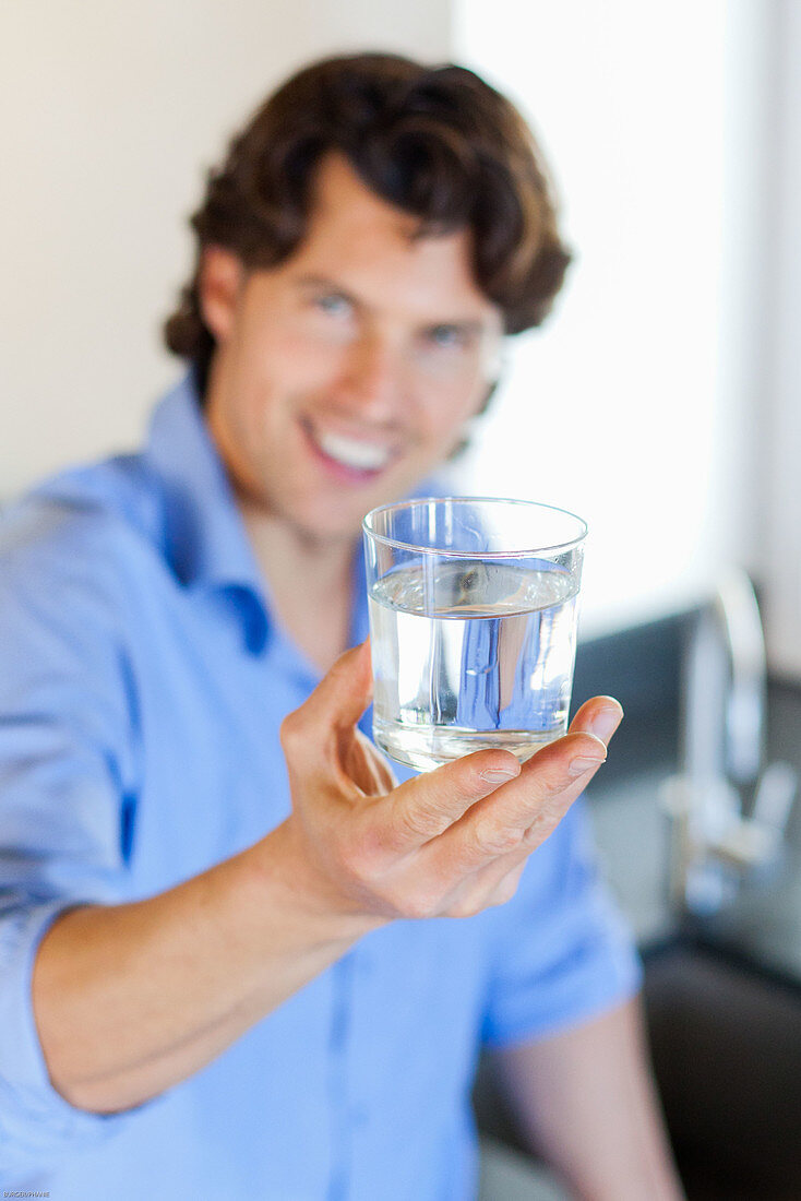 Man drinking glass of water