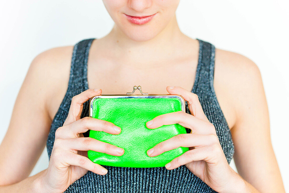 Woman holding a moneybox