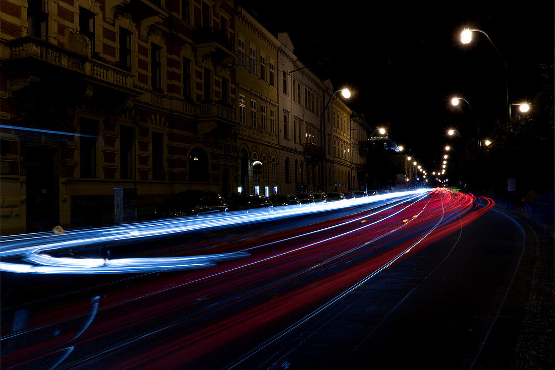 Main road and car tail lights at night