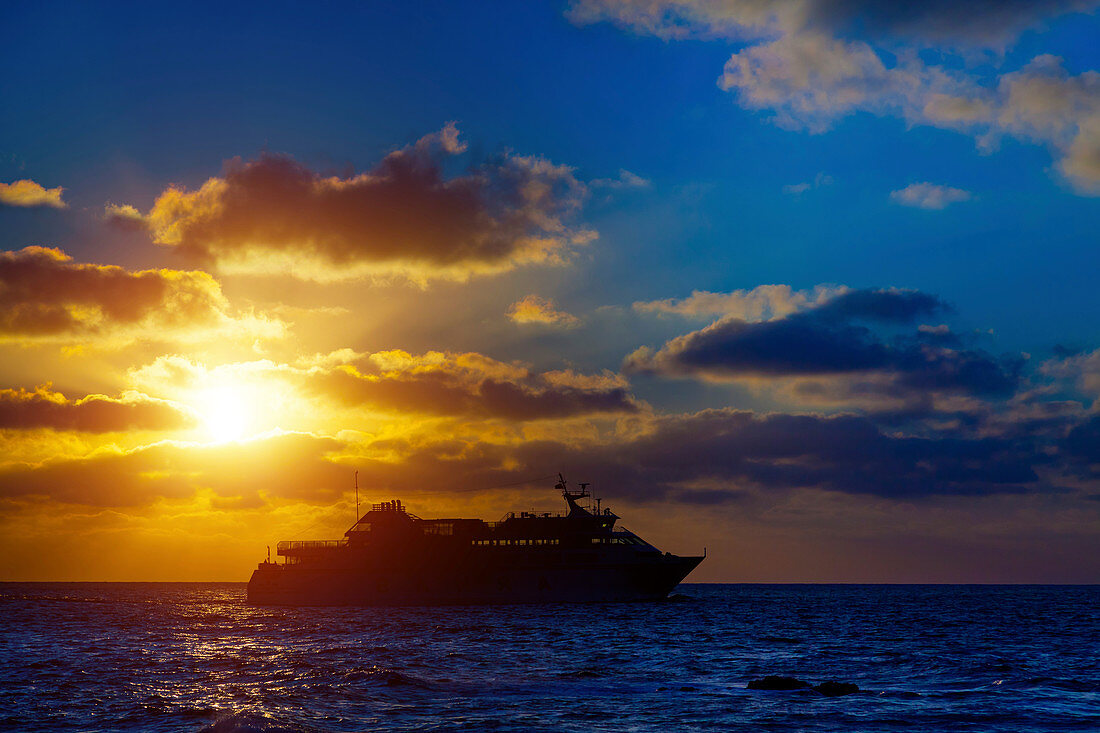 Cruise liner at sunset