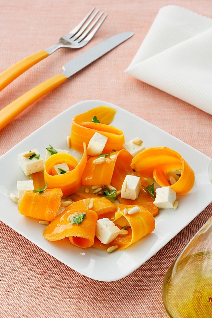Carrot salad with feta and pine nuts