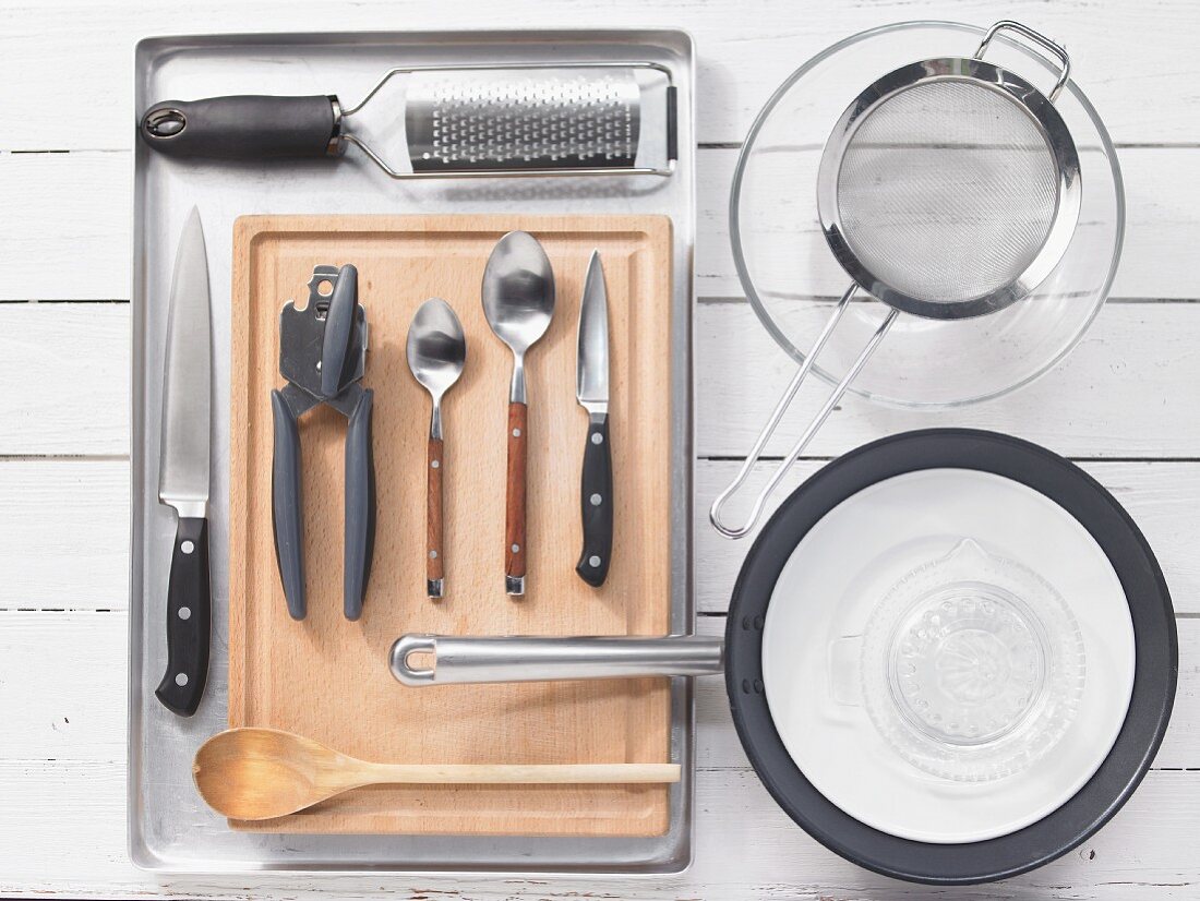 Kitchen utensils for making a sharp zander fillet with peppers and corn