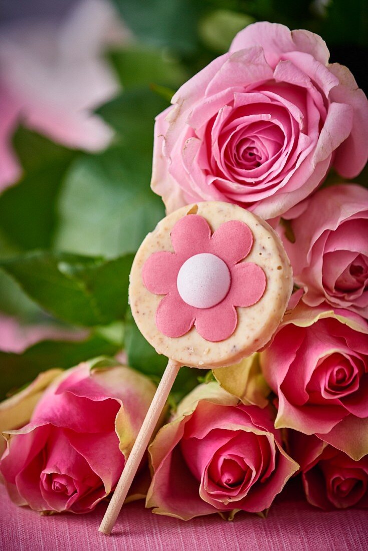 White chocolate lollipop with roses
