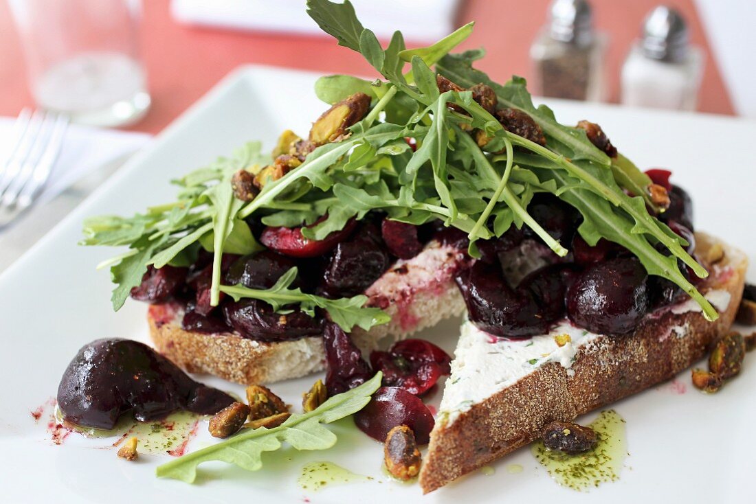 Beet and arugula Bruschetta with chive goat cheese spread