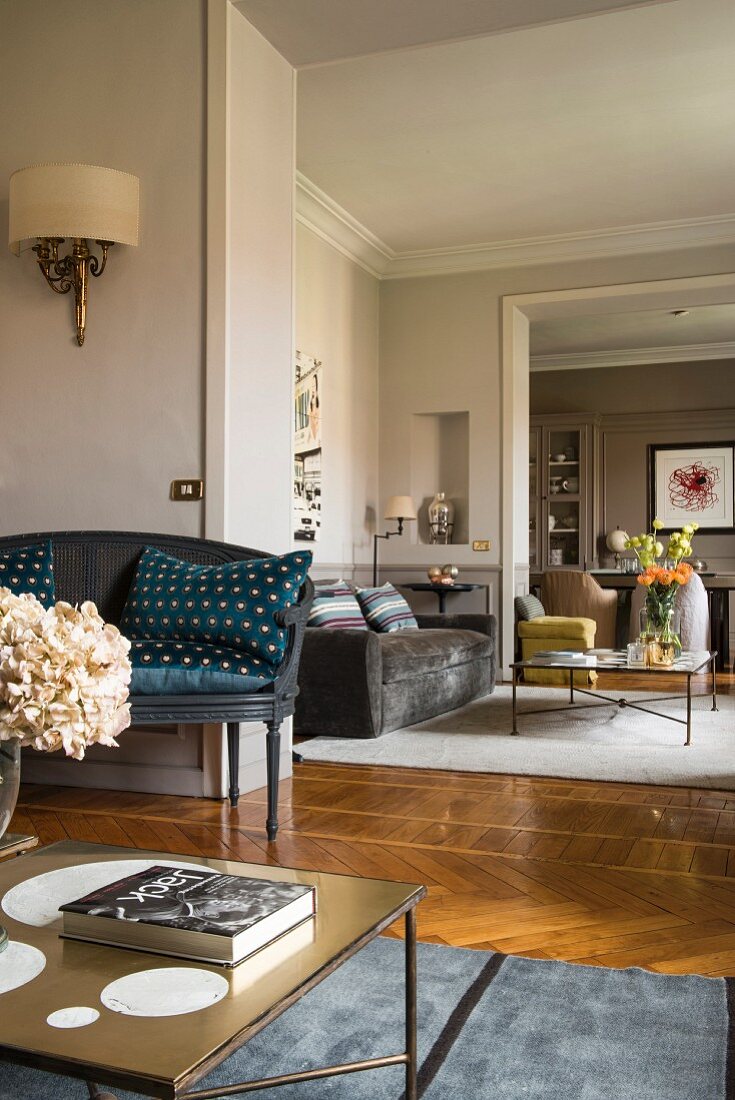 Elegant living room with open doorway leading into next room