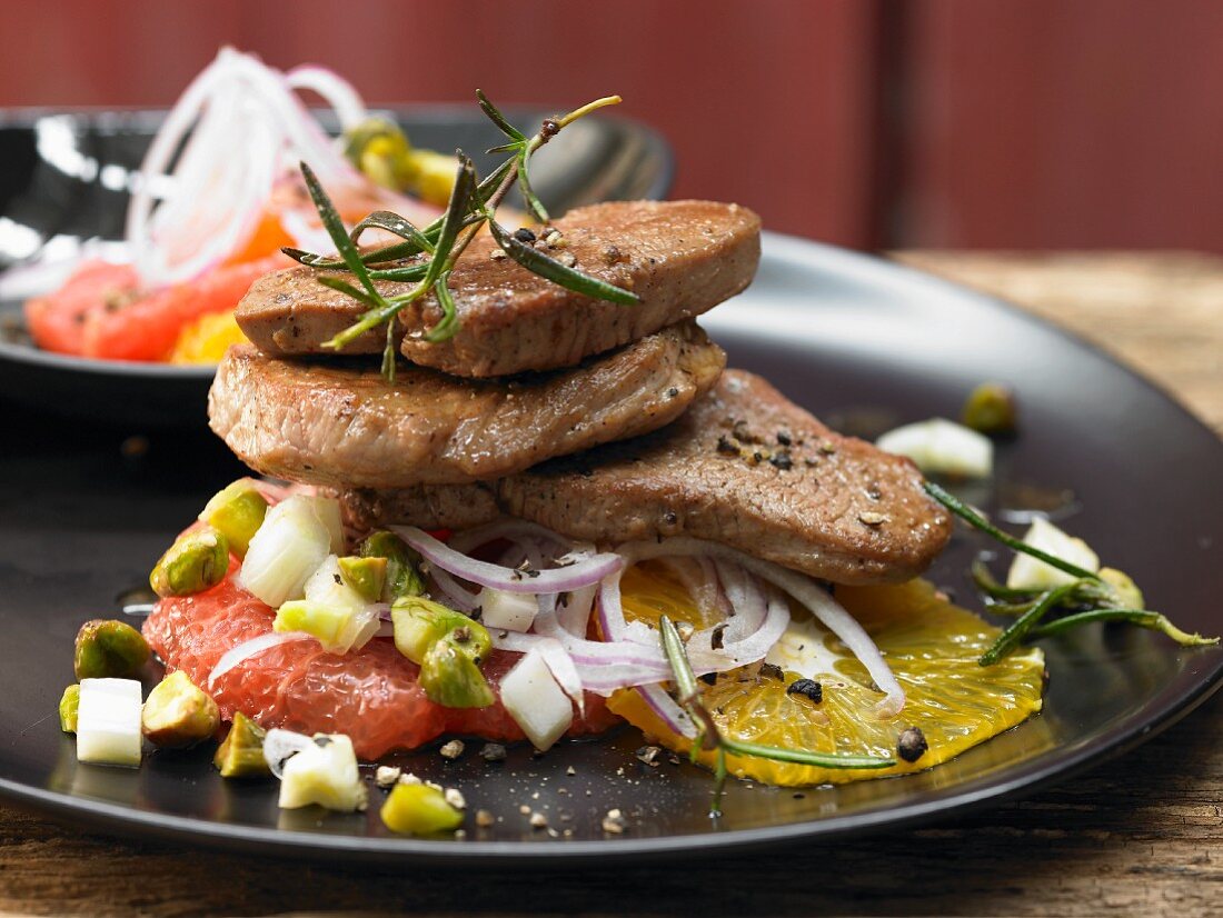 Sicilian style veal fillets with orange and grapefruit salad