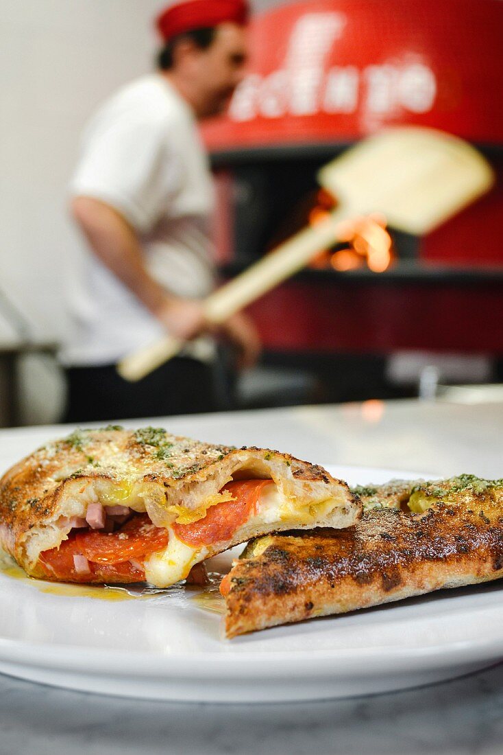 Slices of pizza on a plate in a pizzeria