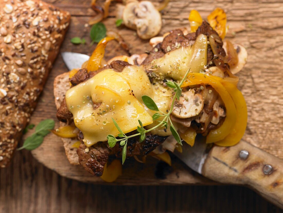 Minute steaks with yellow pepper and onion