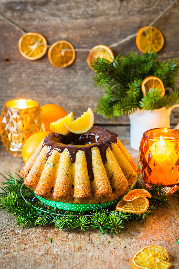 Baba with chocolate glaze and oranges for Christmas