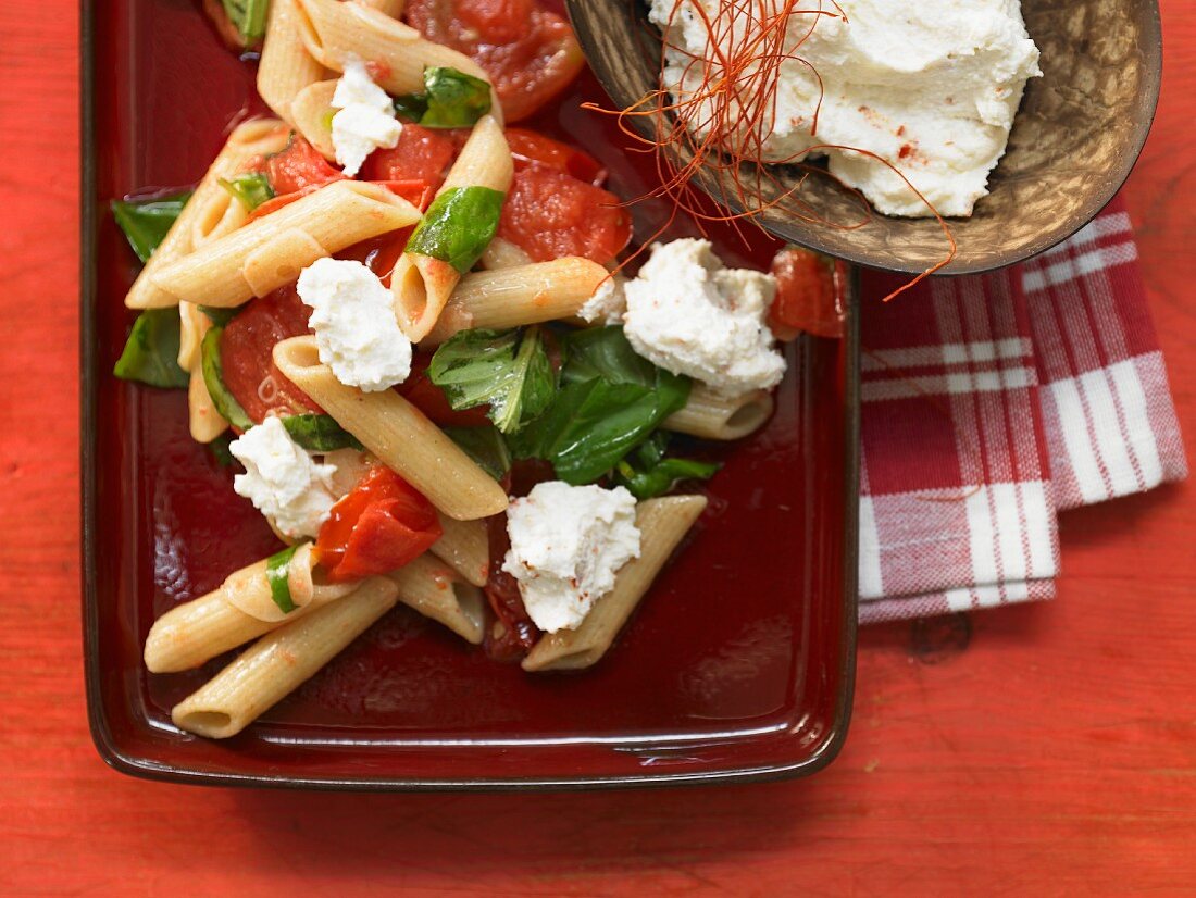 Penne with chilli ricotta, tomatoes and basil