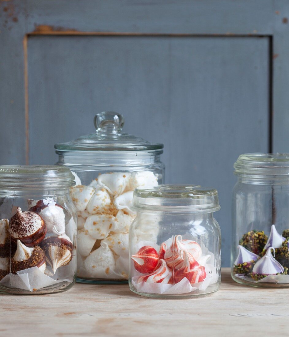 Small meringue drops in storage jars