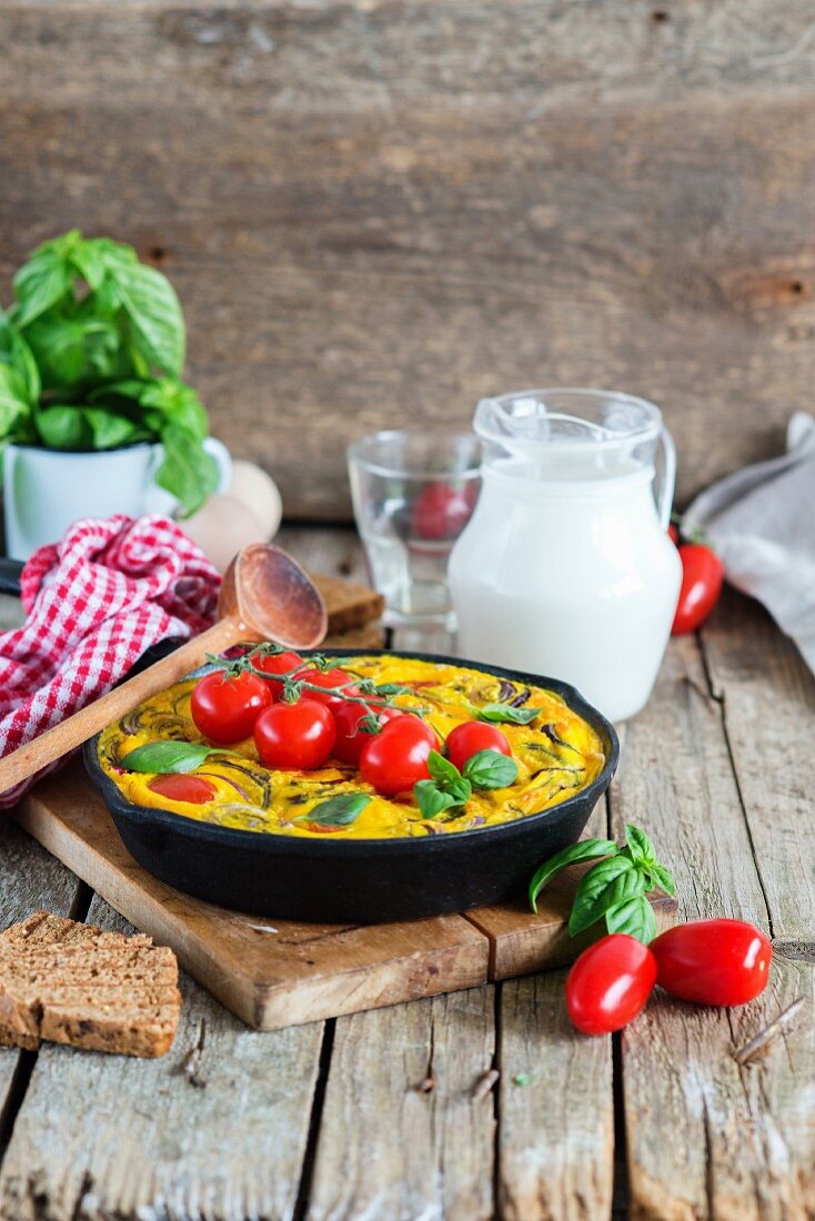 Baked eggs with cherry tomatoes