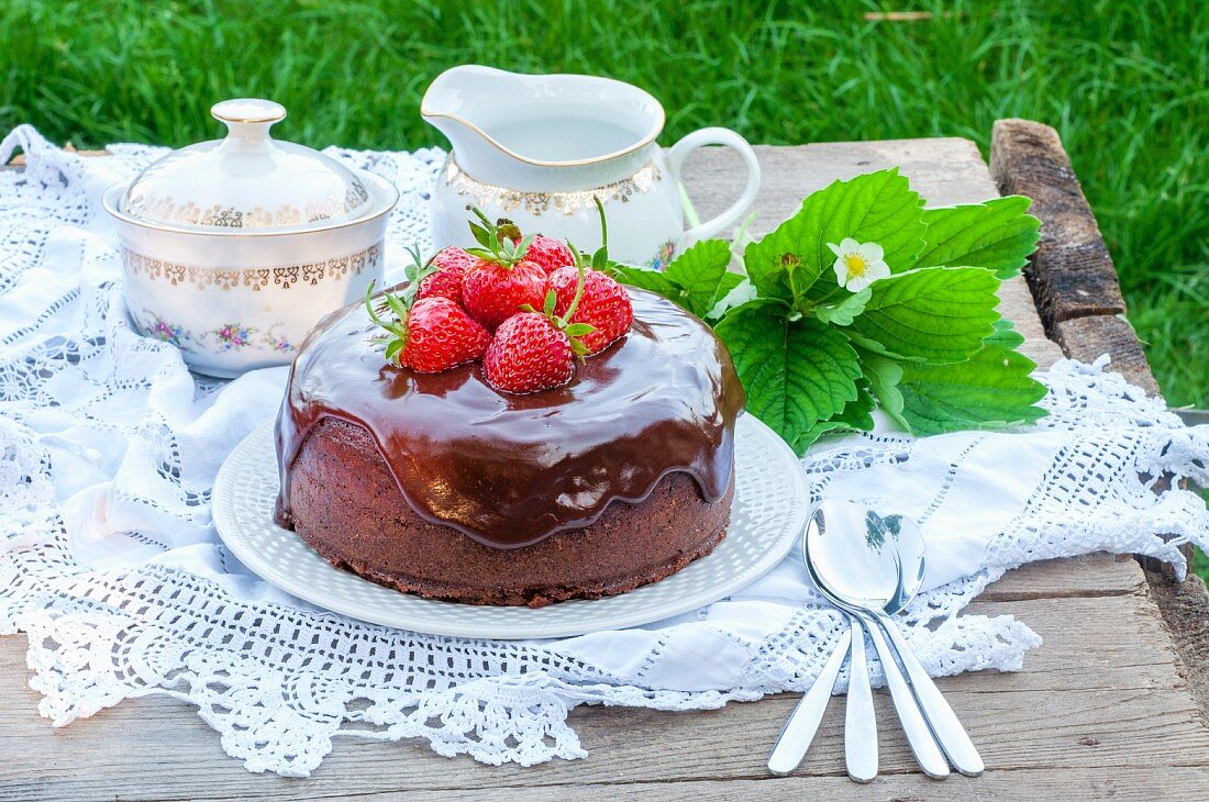 Chocolate cake topped with strawberries