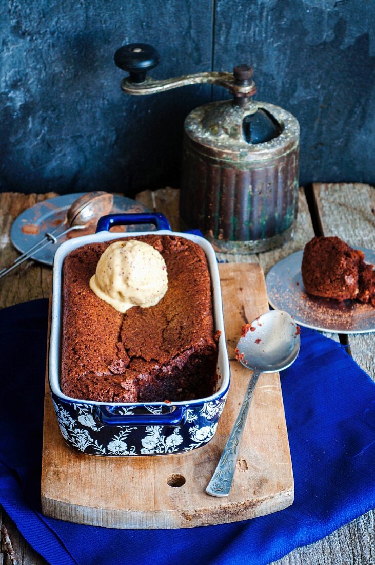Chocolate cake served hot from the oven with a scoop of vanilla ice cream
