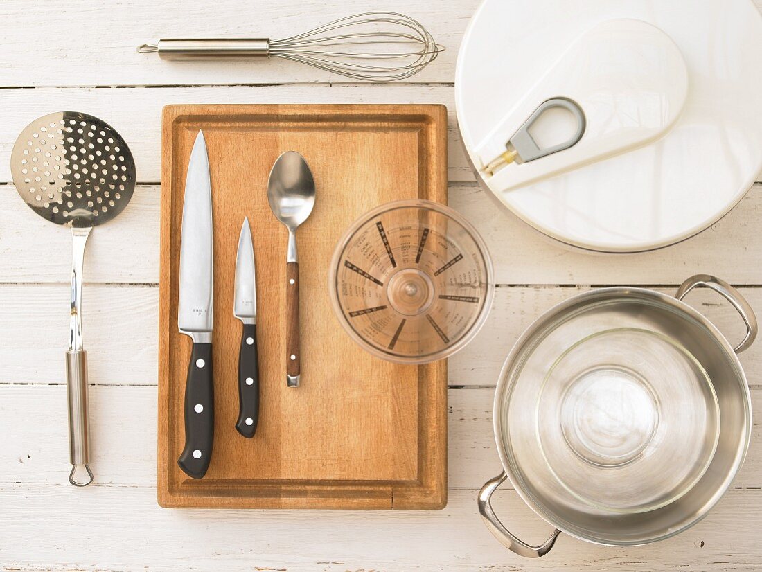 Kitchen utensils for the preparation of a brasserie salad with a poached egg