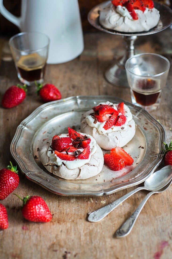 Mini pavlovas with strawberries and chocolate