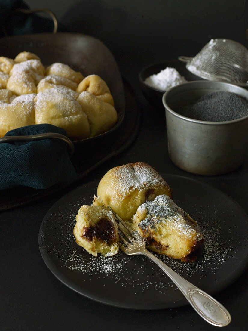 Steamed dumplings with jam, poppy seeds and sugar