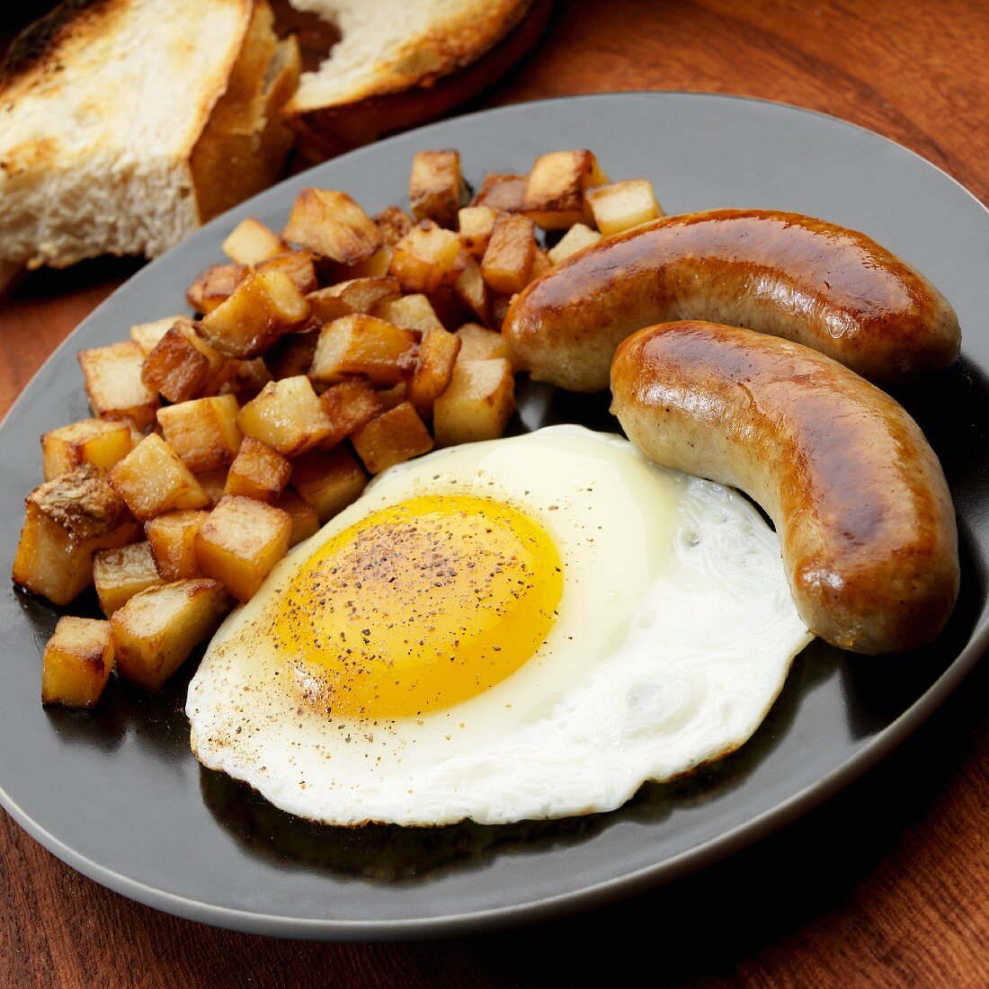 Fried egg with two bangers