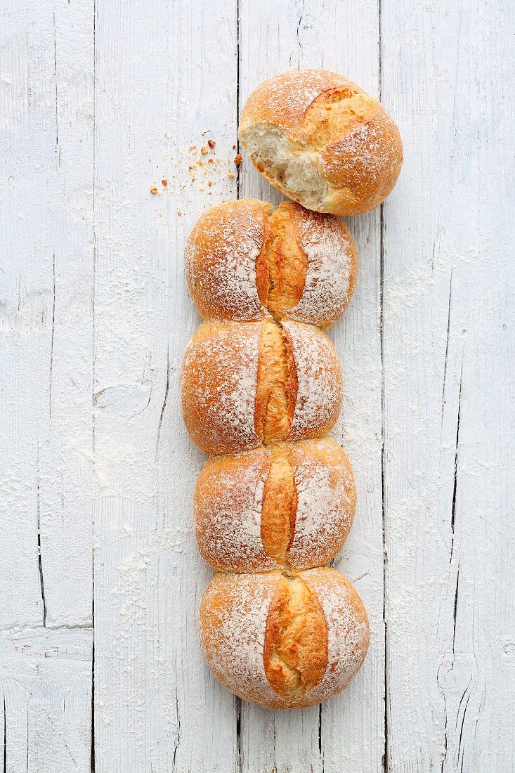 A row of Swiss crusty bread rolls