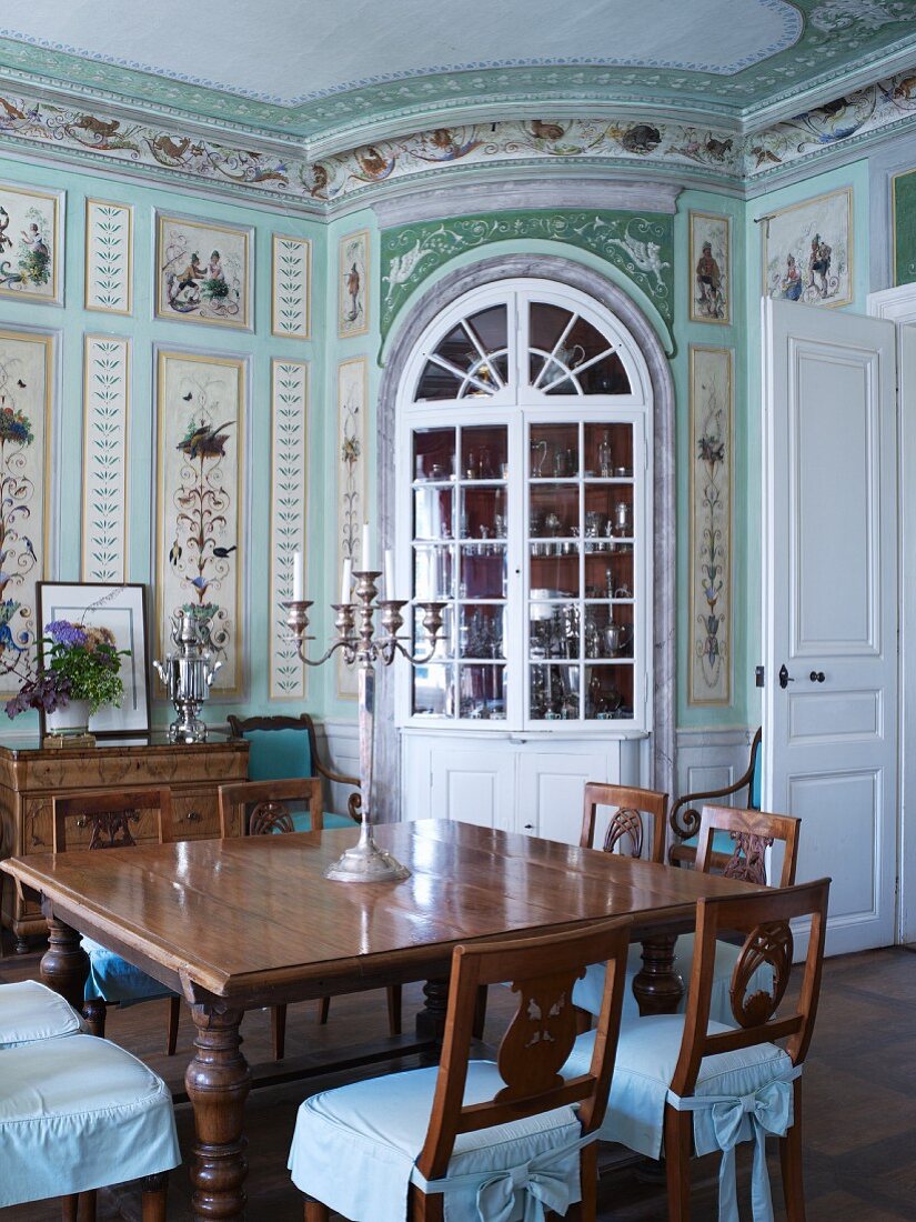 Historical dining room with painted walls in stately home