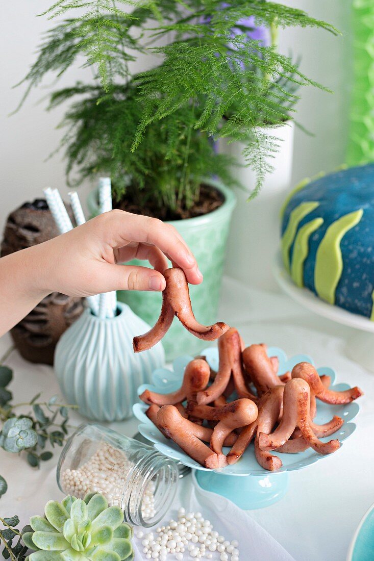 Small octopus sausages for a maritime themed party